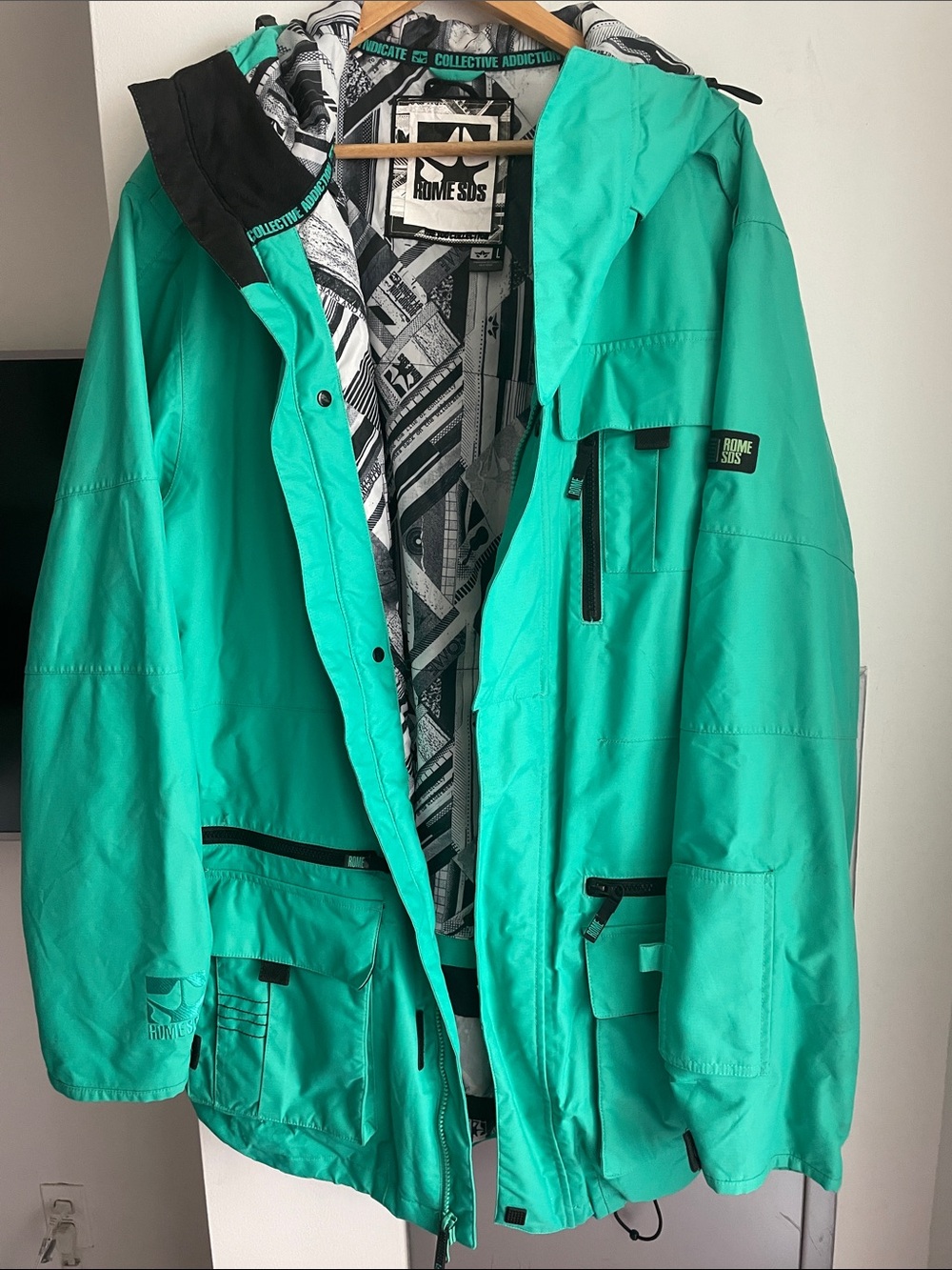 Men's Teal Waterproof Jacket, size L.